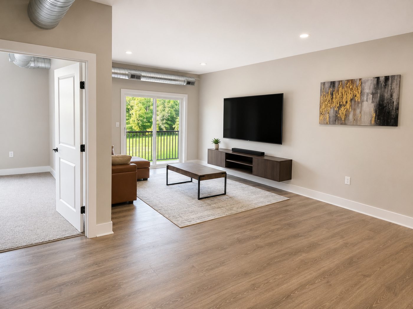 Spacious living room with walk-out patio doors