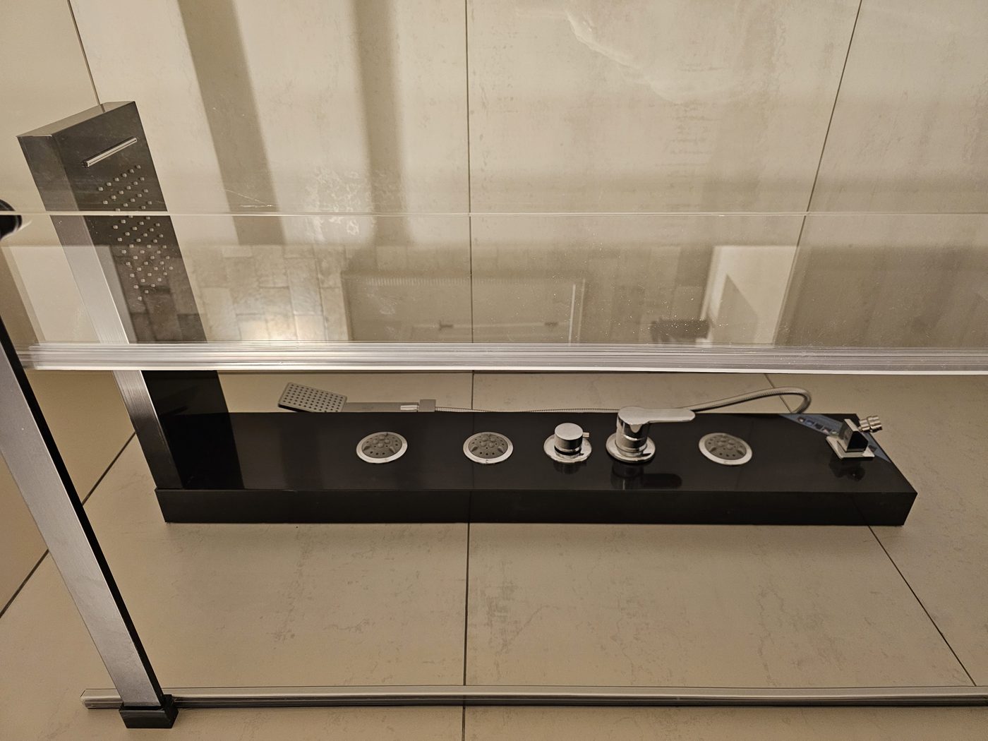 Spa shower panel with massage jets